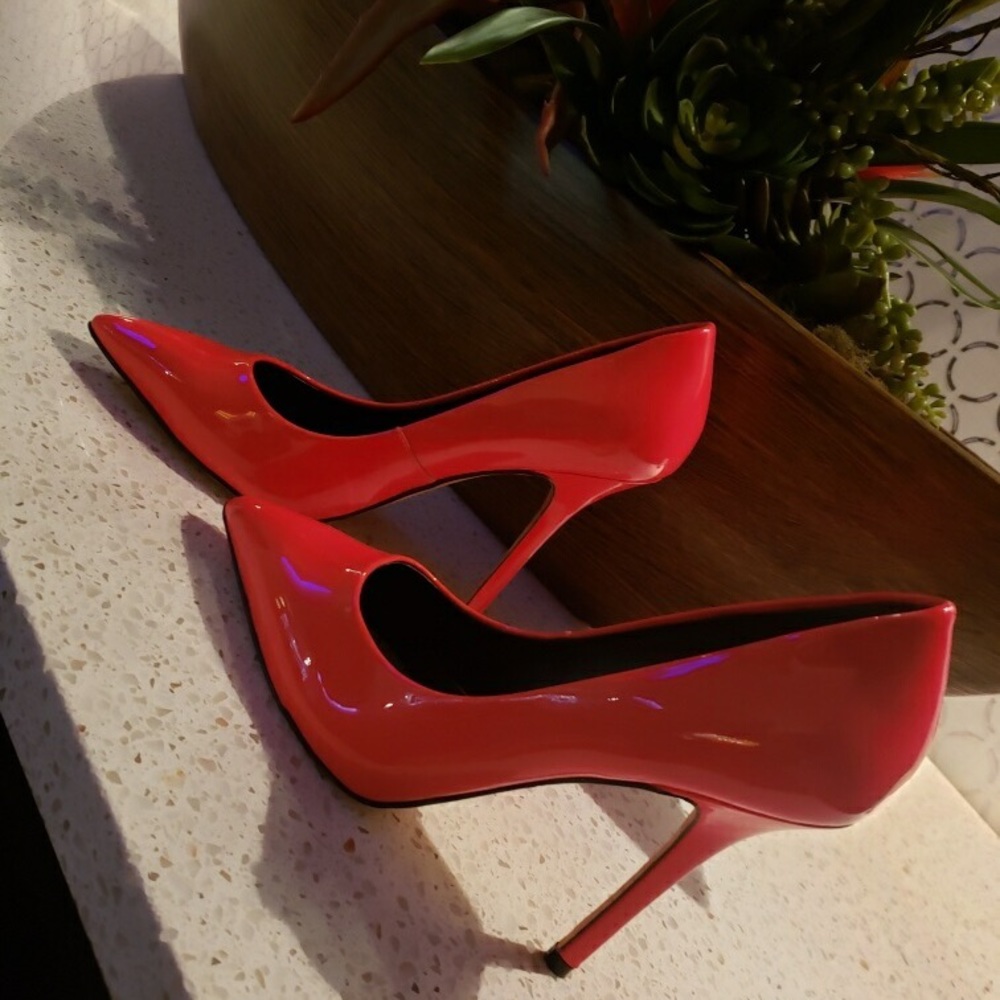 Neon pink stilettos.